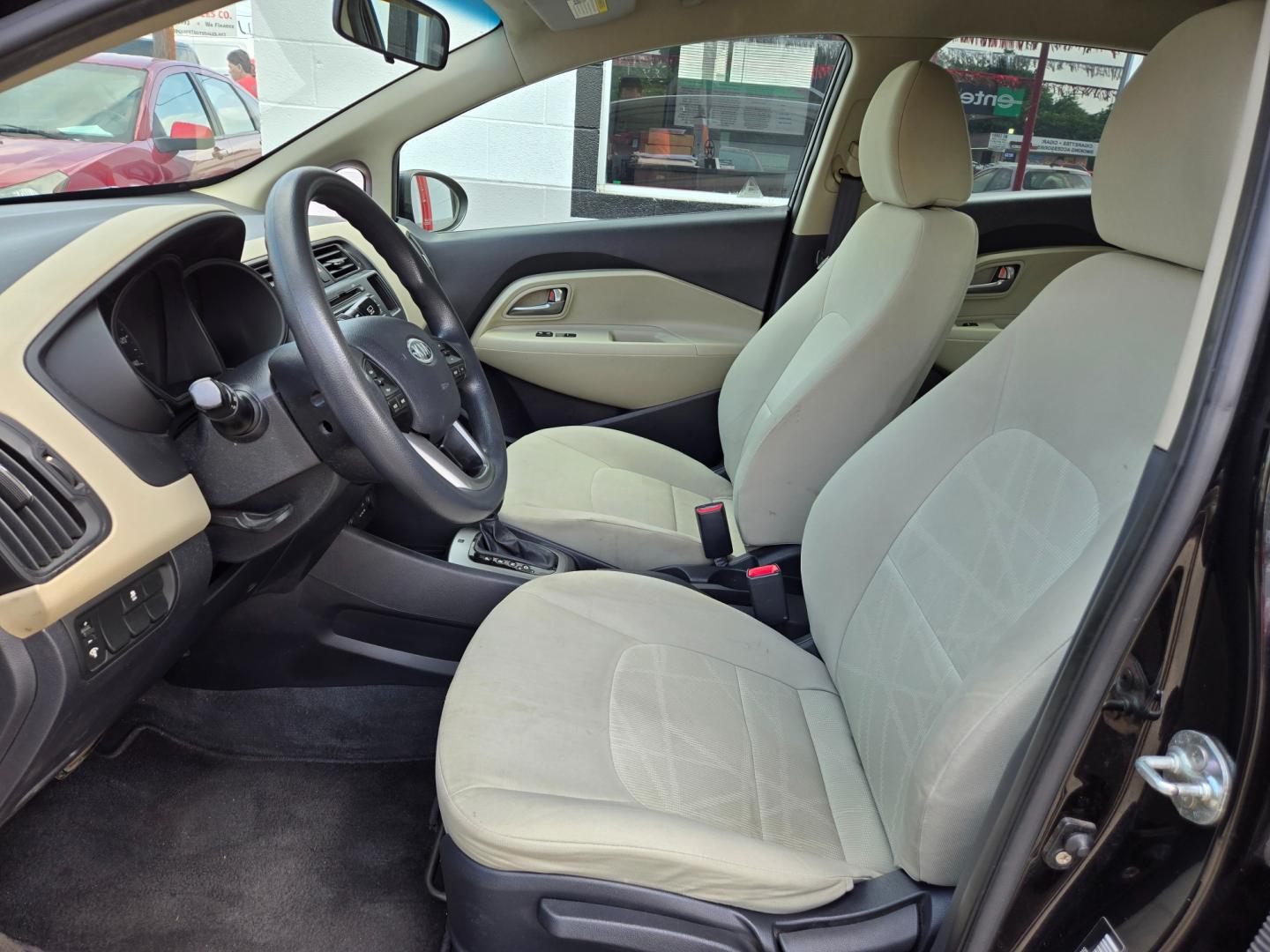 2012 Black Kia Rio (KNADM5A30C6) with an 1.6L I4 F DOHC 16V engine, Automatic transmission, located at 503 West Court, Seguin, TX, 78155, (830) 379-3373, 29.568621, -97.969803 - Photo#4